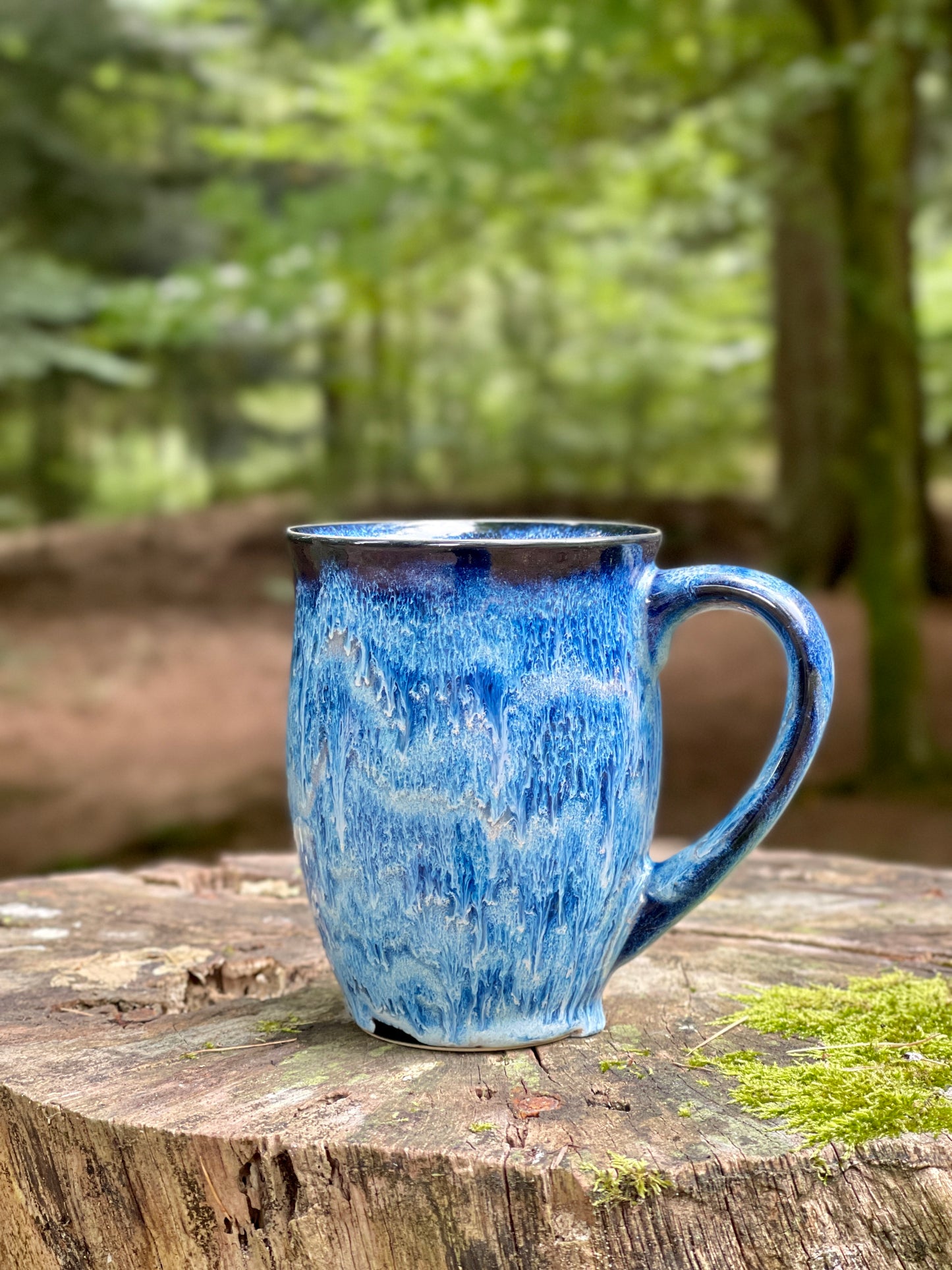 A large mug with a bicycle