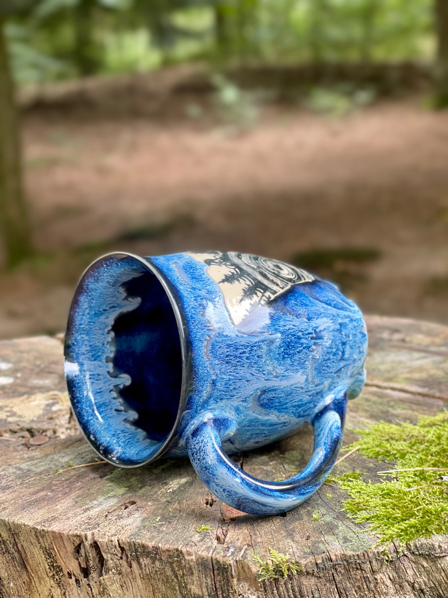 A large mug with a bicycle